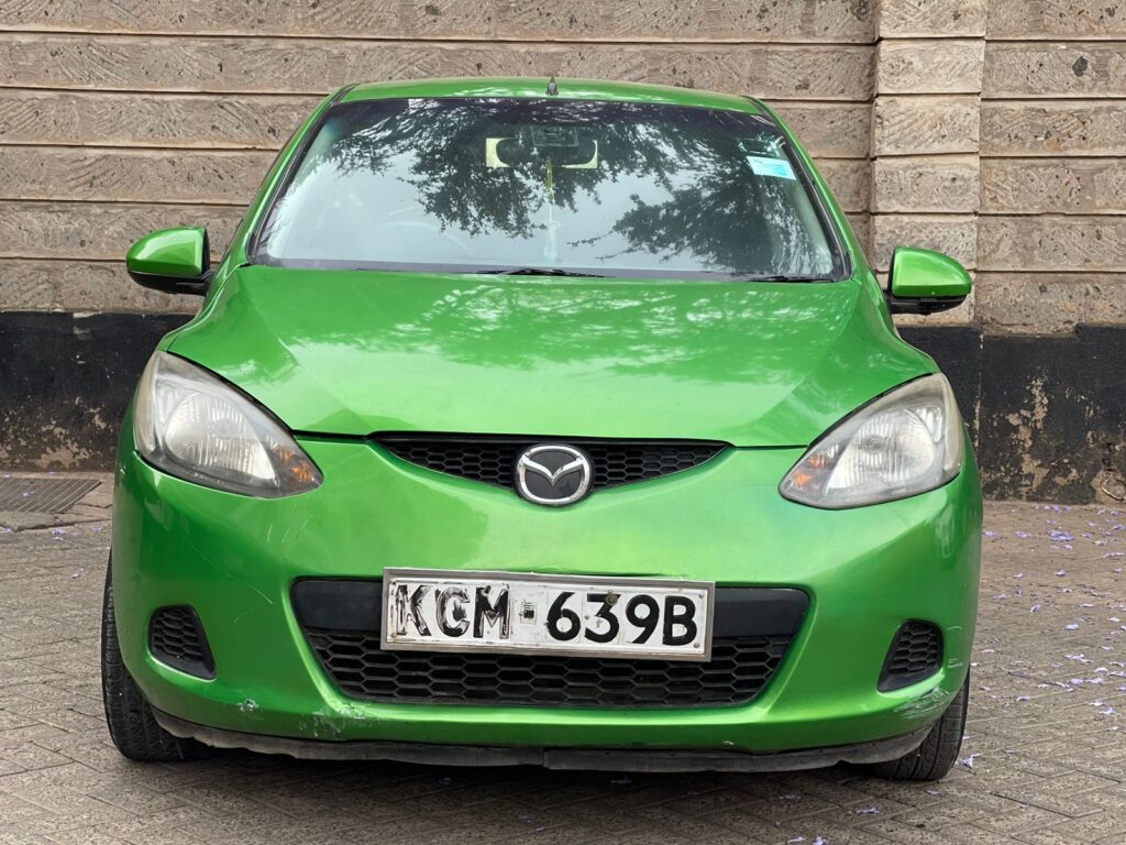 Used cars under 700k Kenya - Green Mazda Demio 2010