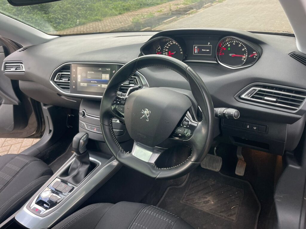 Lipa mdogo mdogo vehicles in Kenya 2016 Peugeot 308 with MoonRoof 